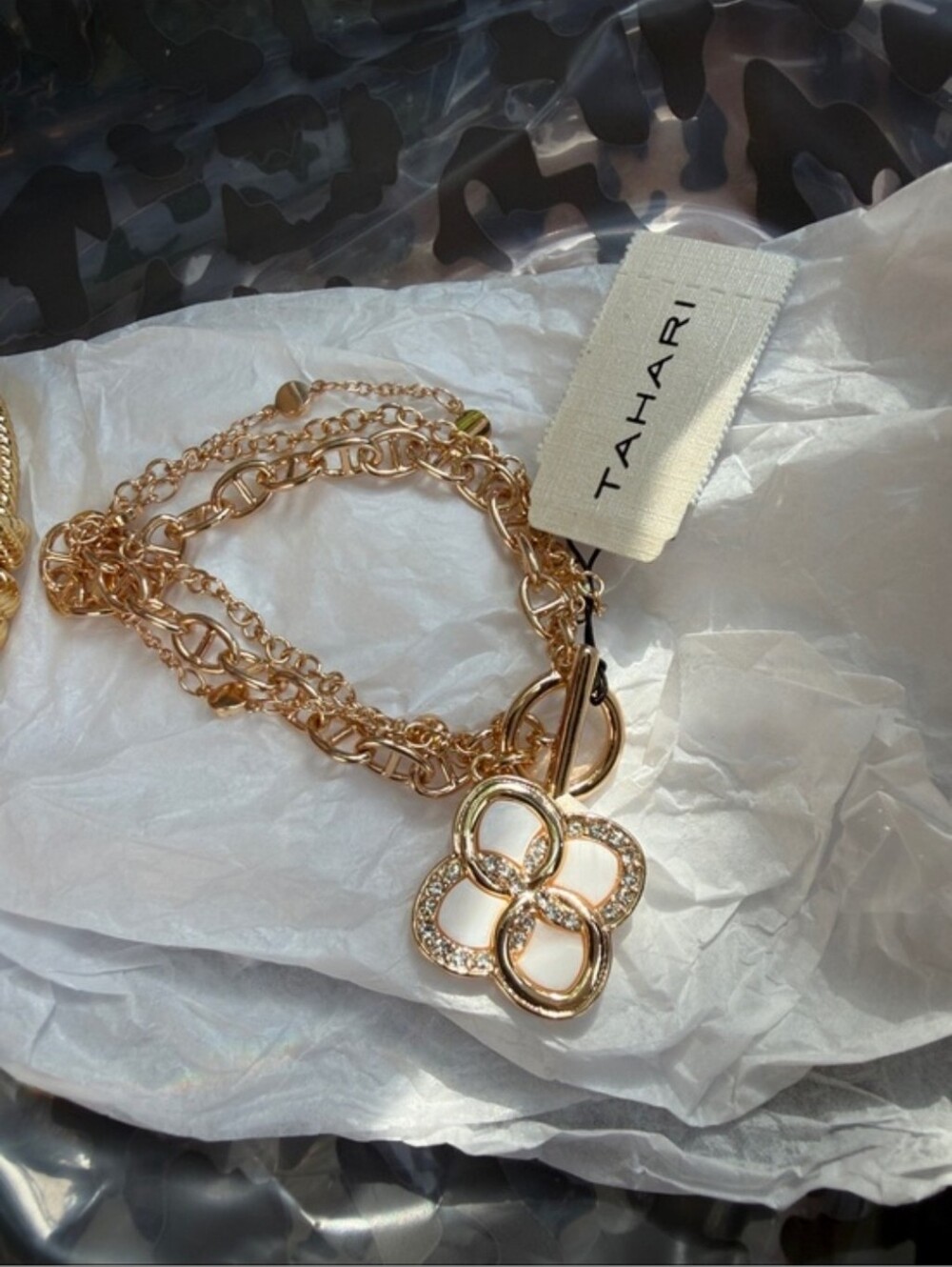 Tahari Rose Gold Multi-Chain Bracelet with Crystal Clover Pendant